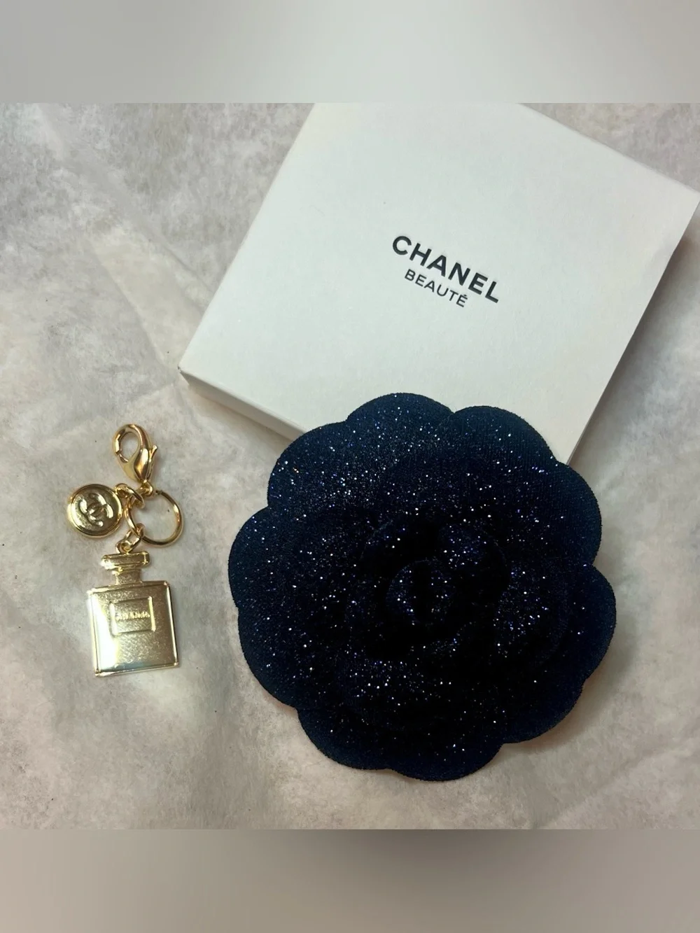 CHANEL Novelty Holiday 2025 Navy Sparkle Camellia Flower Pin